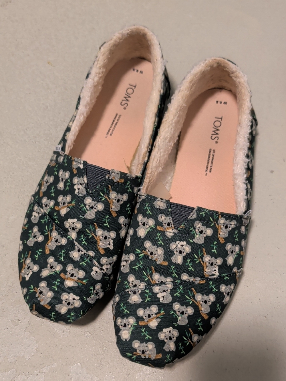 TOMS Black Koala Print Slip-On Flats